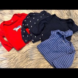 Carter’s Four Matching Long Sleeve Onesie Set